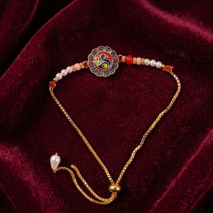 Classic Peacock Rakhi laid out showing full design
