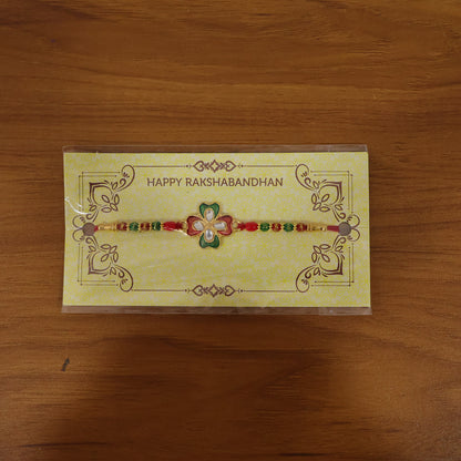 Floral stone designer rakhi displayed on festive background