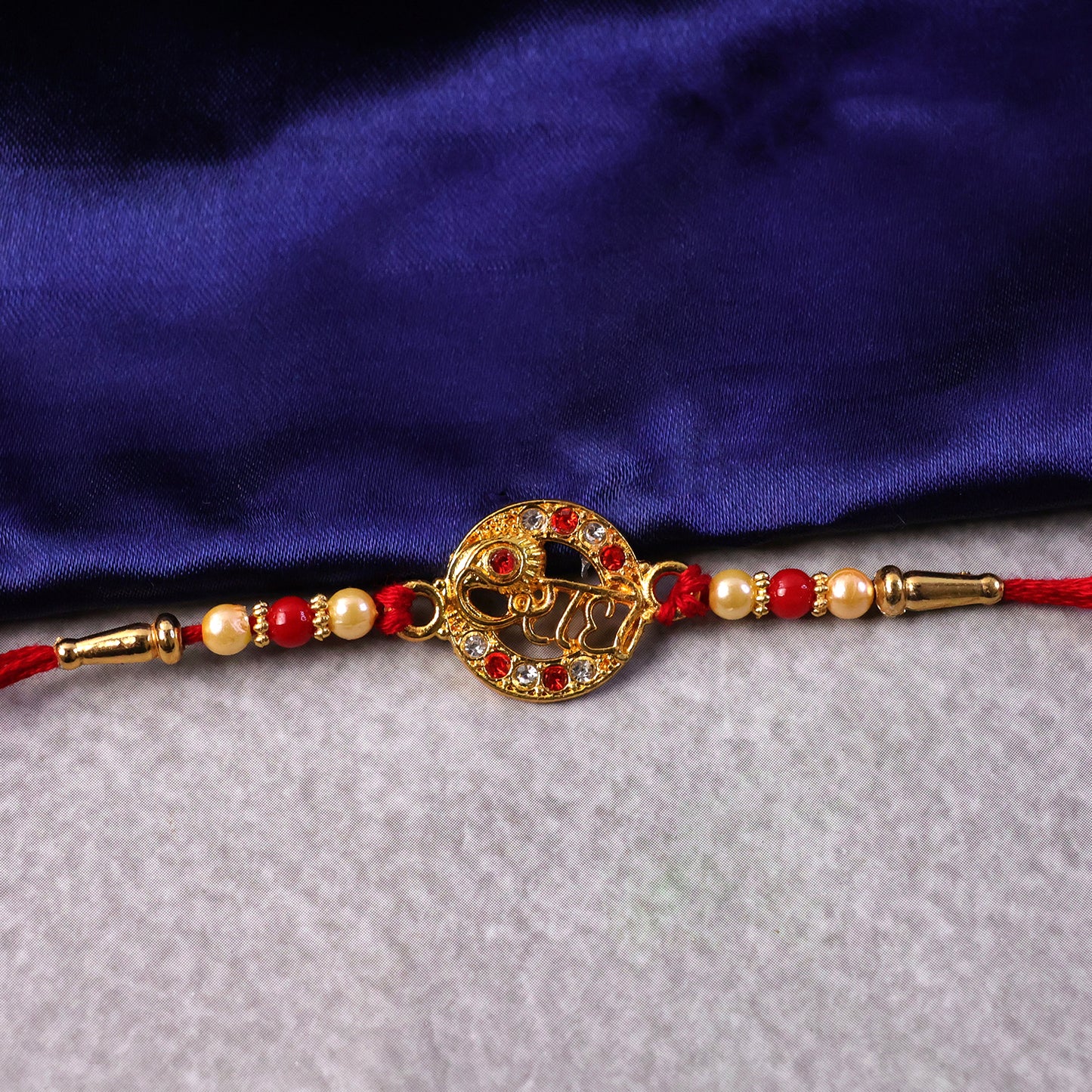 Radhe name rakhi displayed with vibrant background