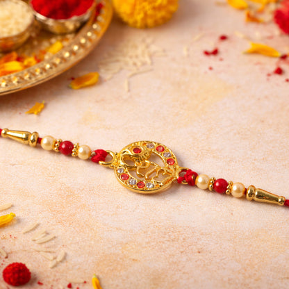 Close-up of Radhe name rakhi with colorful beads