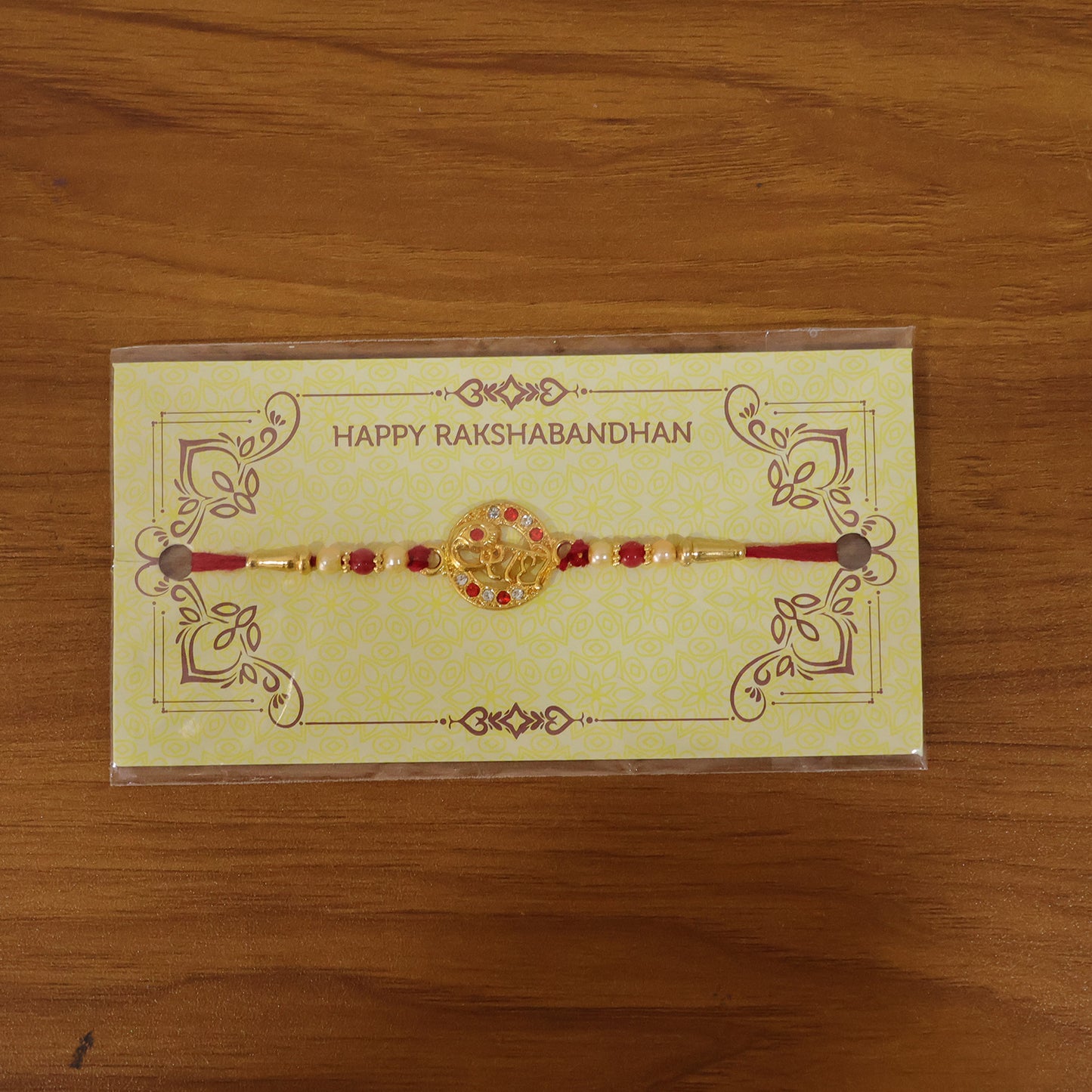 Live view of Premium Radhe Designer Rakhi on wrist