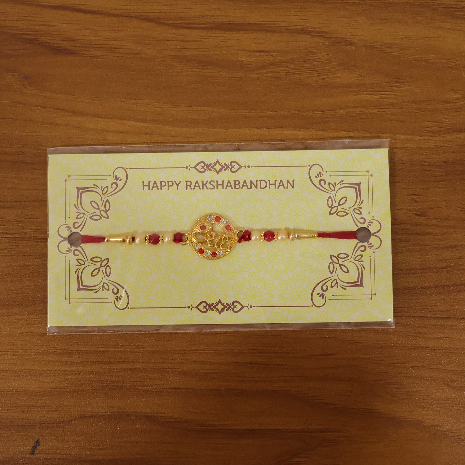 Live view of Premium Radhe Designer Rakhi on wrist