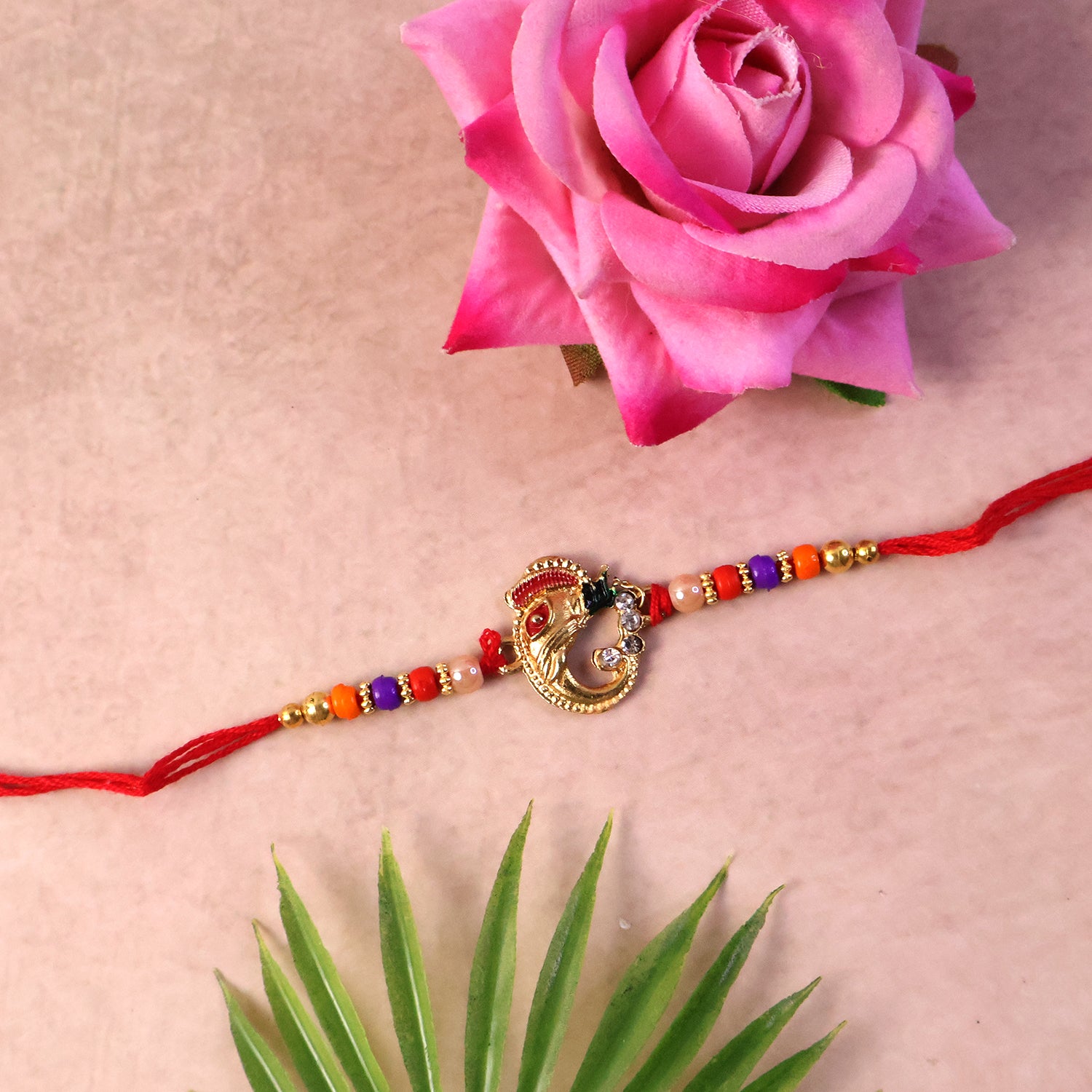 Elegant rakhi for brother with intricate threadwork