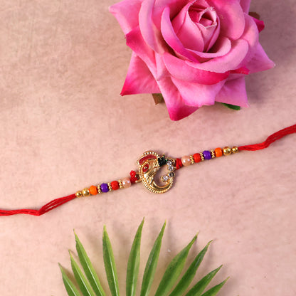 Elegant rakhi for brother with intricate threadwork