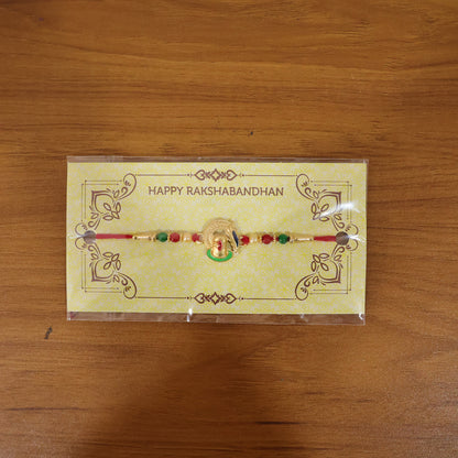 Traditional Designer Ganesha Rakhi in natural setting