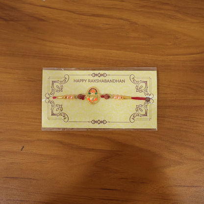 Live image of Ganesha design rakhi on hand