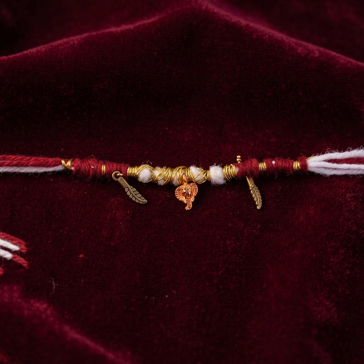 Traditional Ganesh Rakhi with Gold Wire