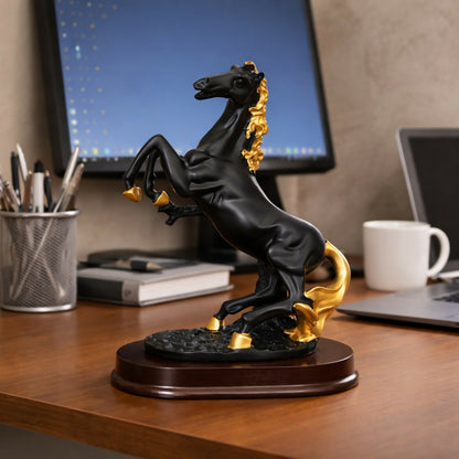 Close-up of horse statue showing gold accents