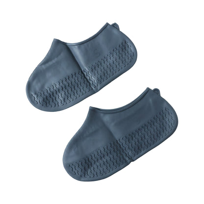 Silicone shoe cover with anti-skid sole on wet surface