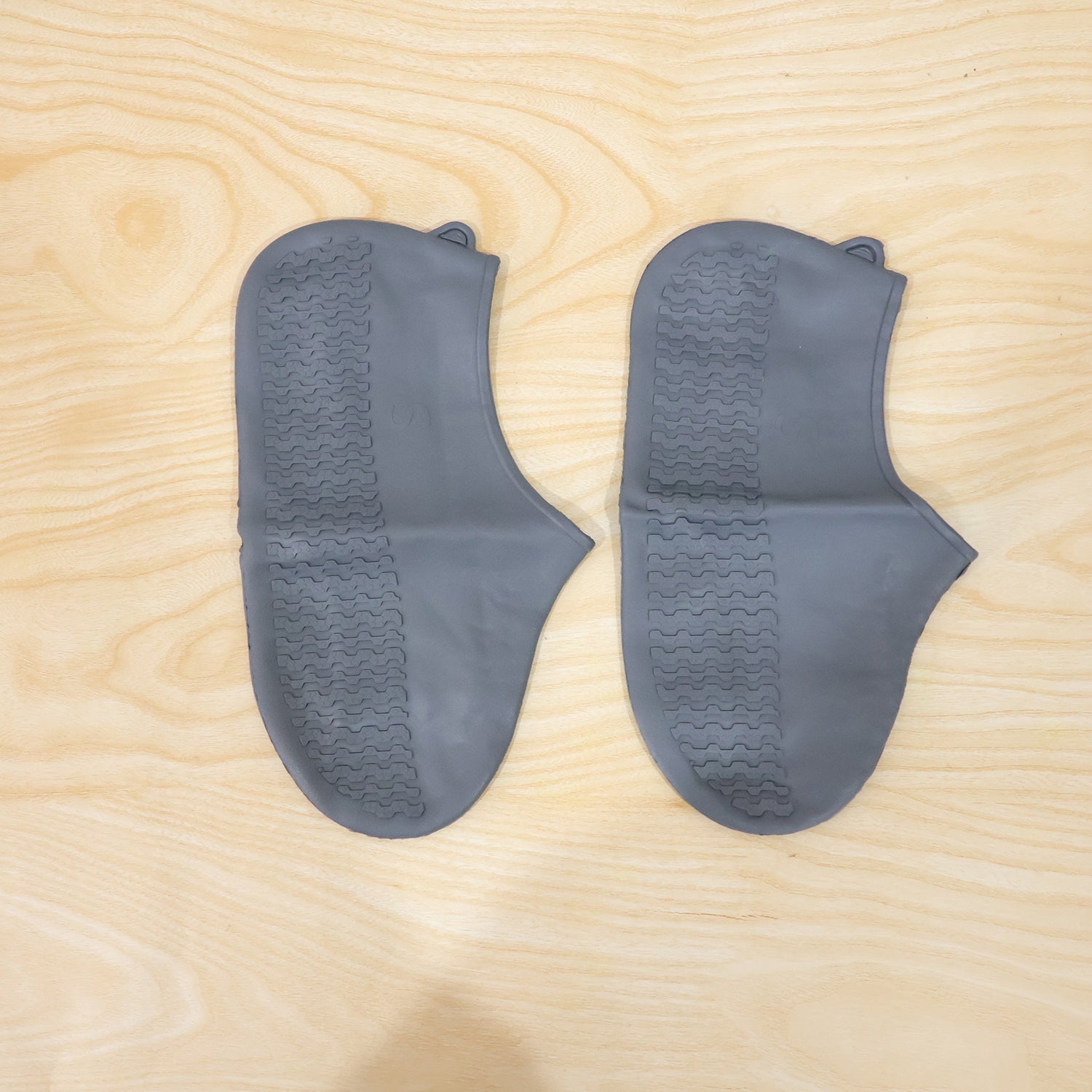 Silicone shoe covers shown in an outdoor use setting