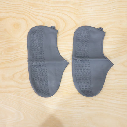 Silicone shoe covers shown in an outdoor use setting