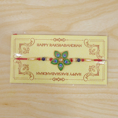 Mor Pankh Rakhi with star design displayed for Raksha Bandhan.