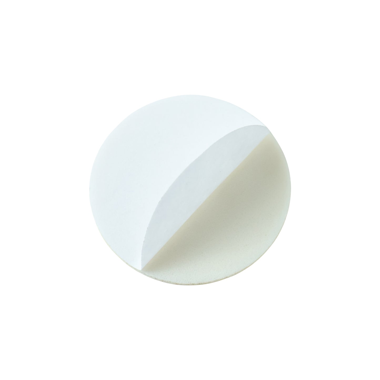 Self-adhesive furniture protection pads on table legs