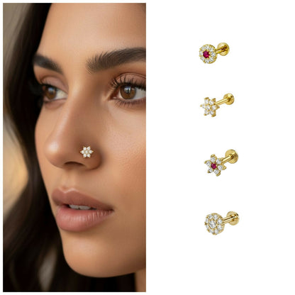 Detailed view of yellow gold plated nosepin stud with cubic zirconia and ruby stones