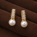 Pearl Drop Earrings – Gold Finish with Sparkling Vertical Bar