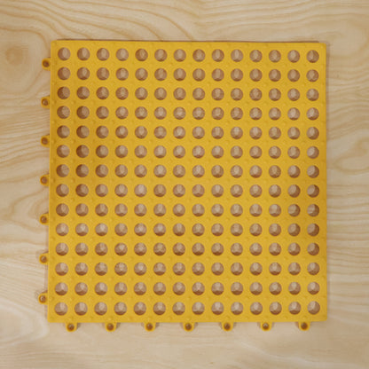 Interlocking safety mats for customized wet area flooring