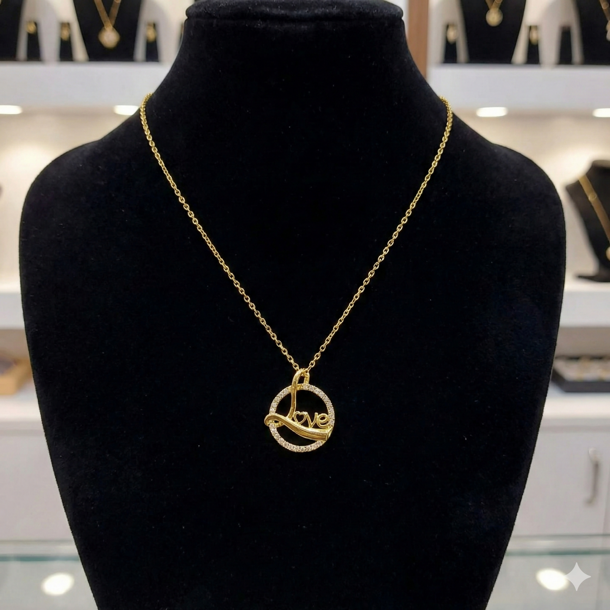 Love Script Circle Pendant Necklace hanging on a delicate gold chain bright and elegant