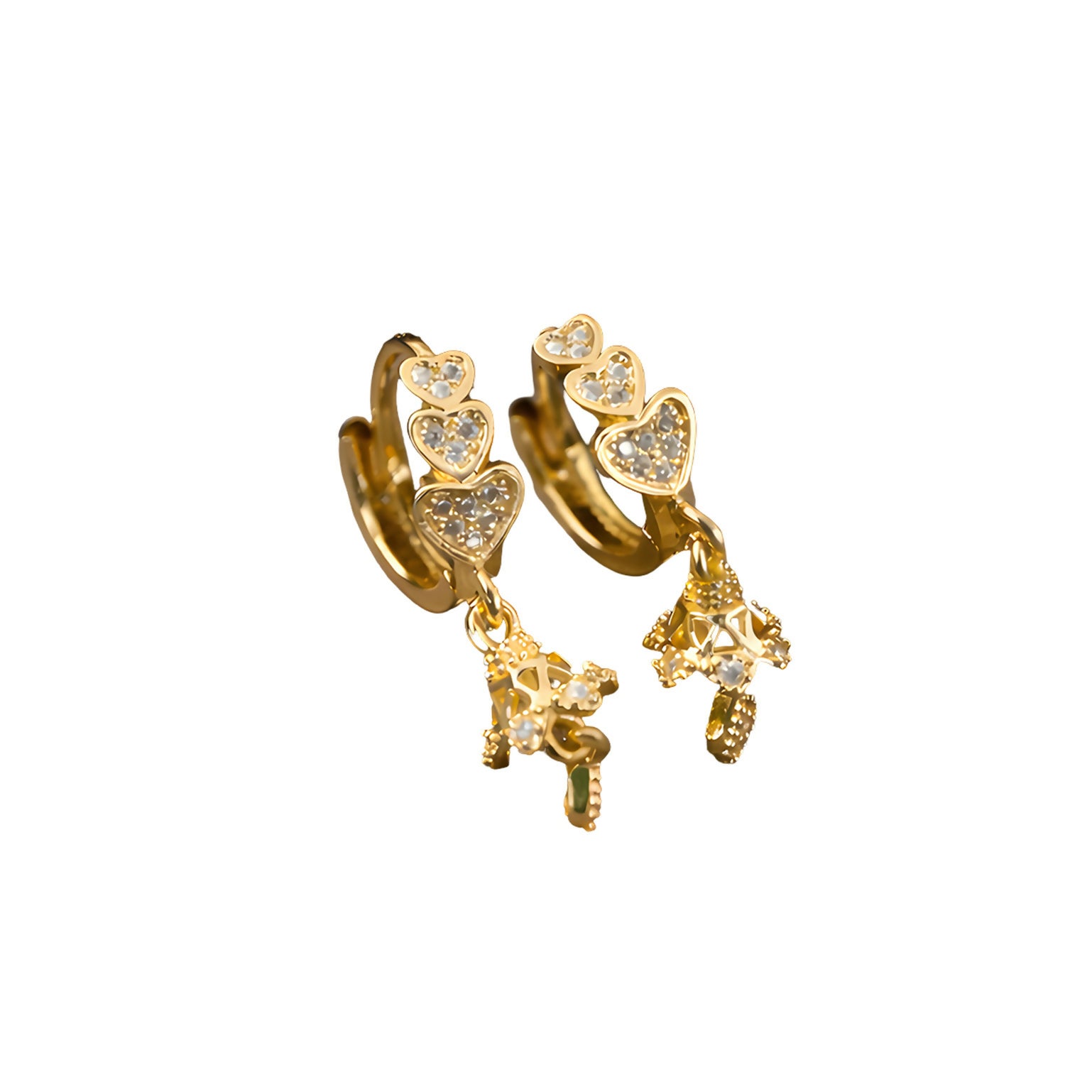 Triple heart drop earrings styled with traditional Indian outfit