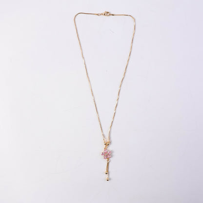 Pink floral crystal pendant necklace styled with festive and western outfits