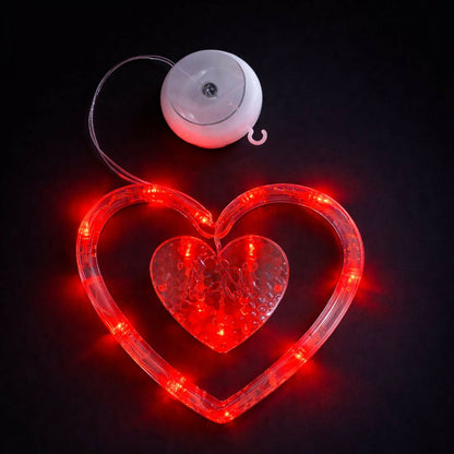 Close-up of heart shape LED hanging light showing bright illumination