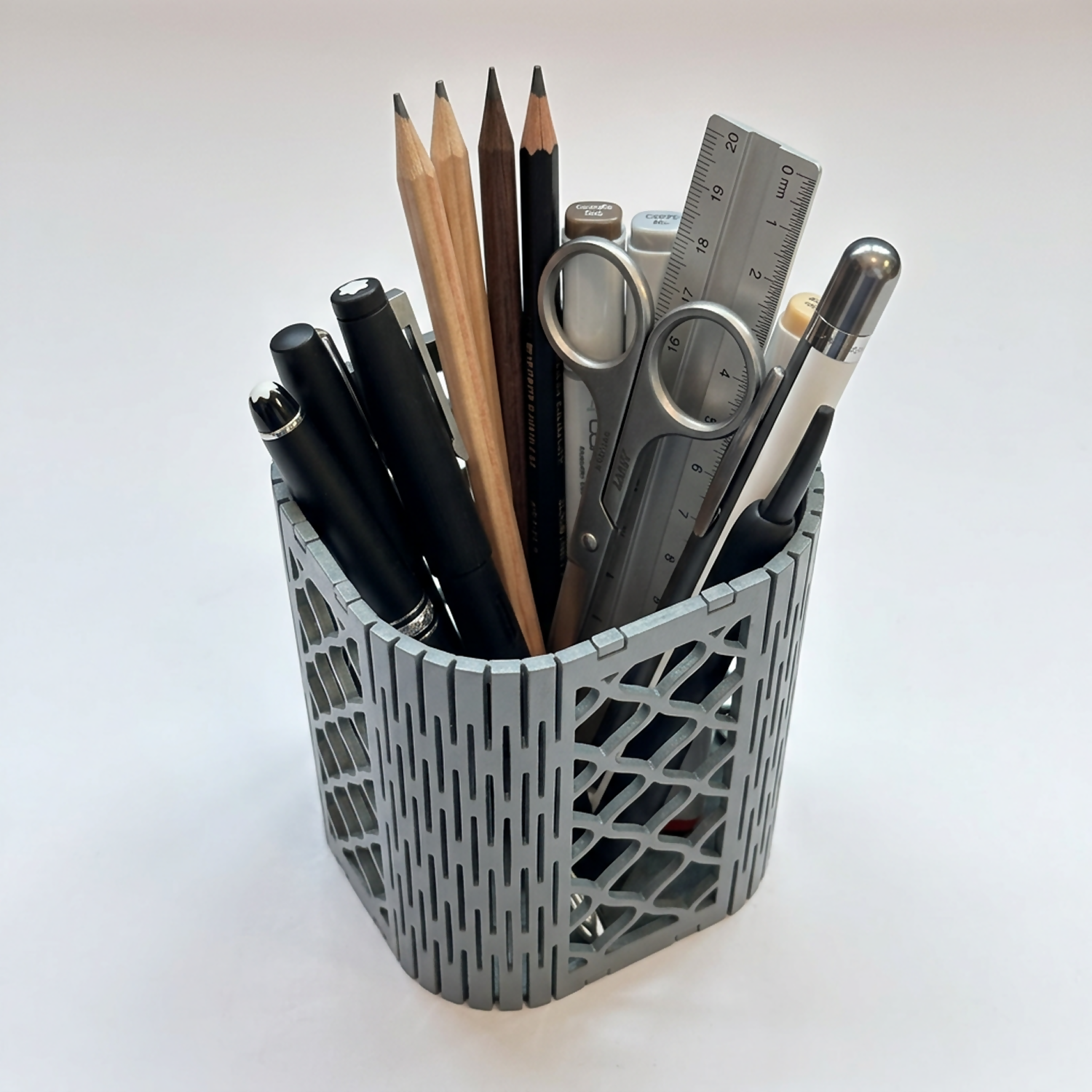 Close-up of the laser-cut geometric pattern on the stylish pen holder.