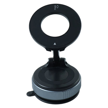 Magnetic phone holder attached to car dashboard