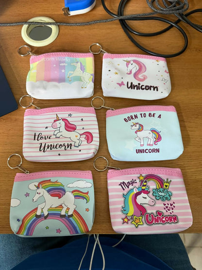 Unicorn mini pouch compact size shown with coins
