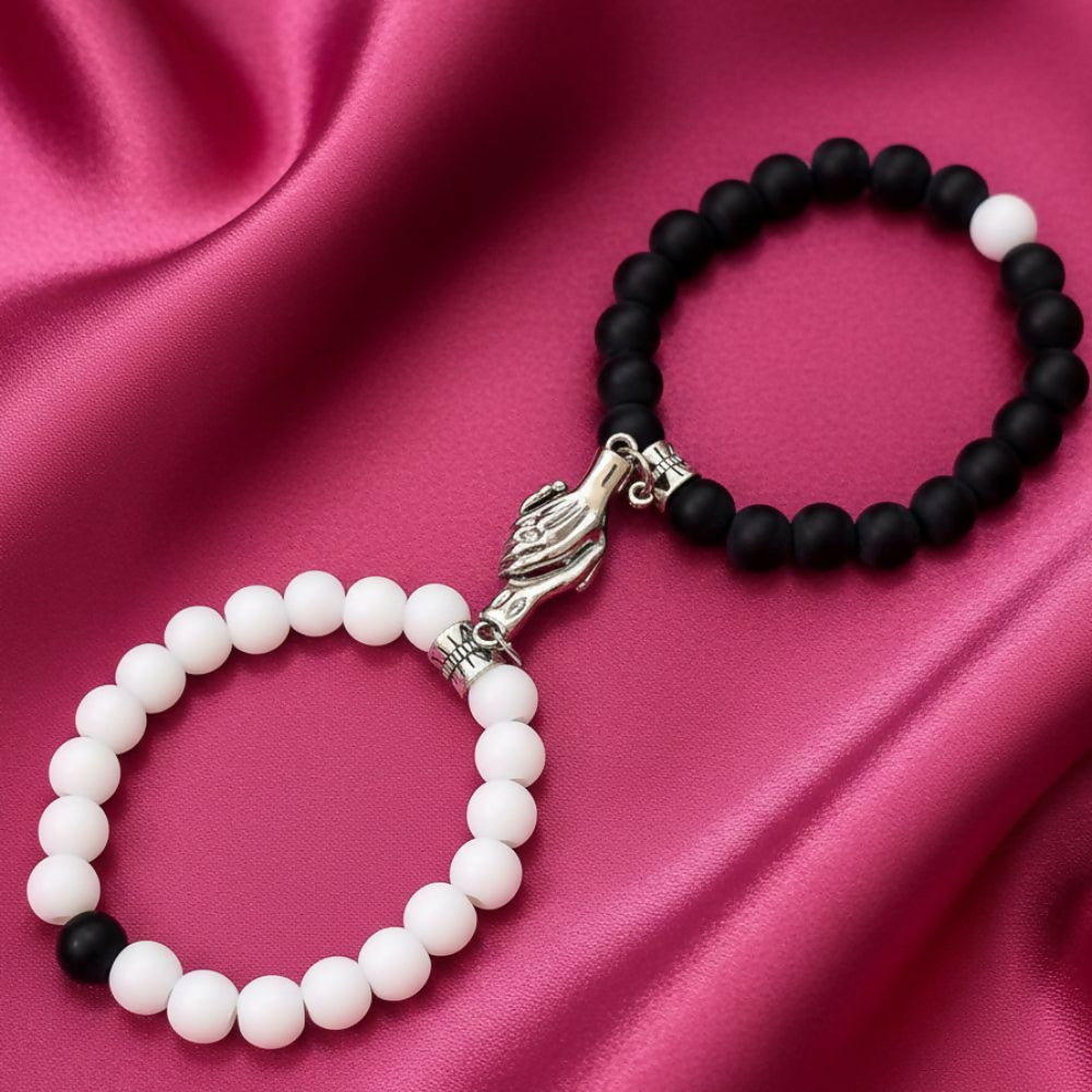 Close-up of Trendy Couple Hand Bracelet worn by couple