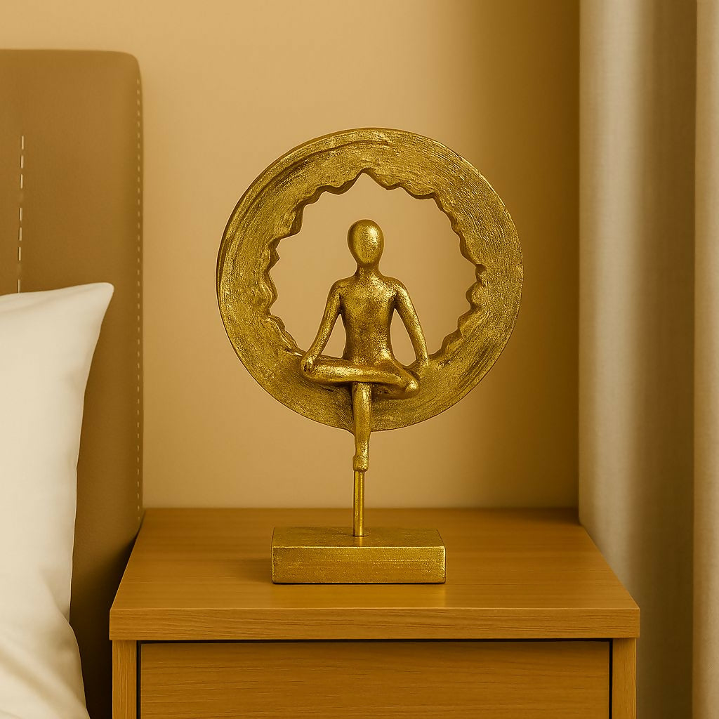 Golden meditating yoga figurine ring sculpture front view
