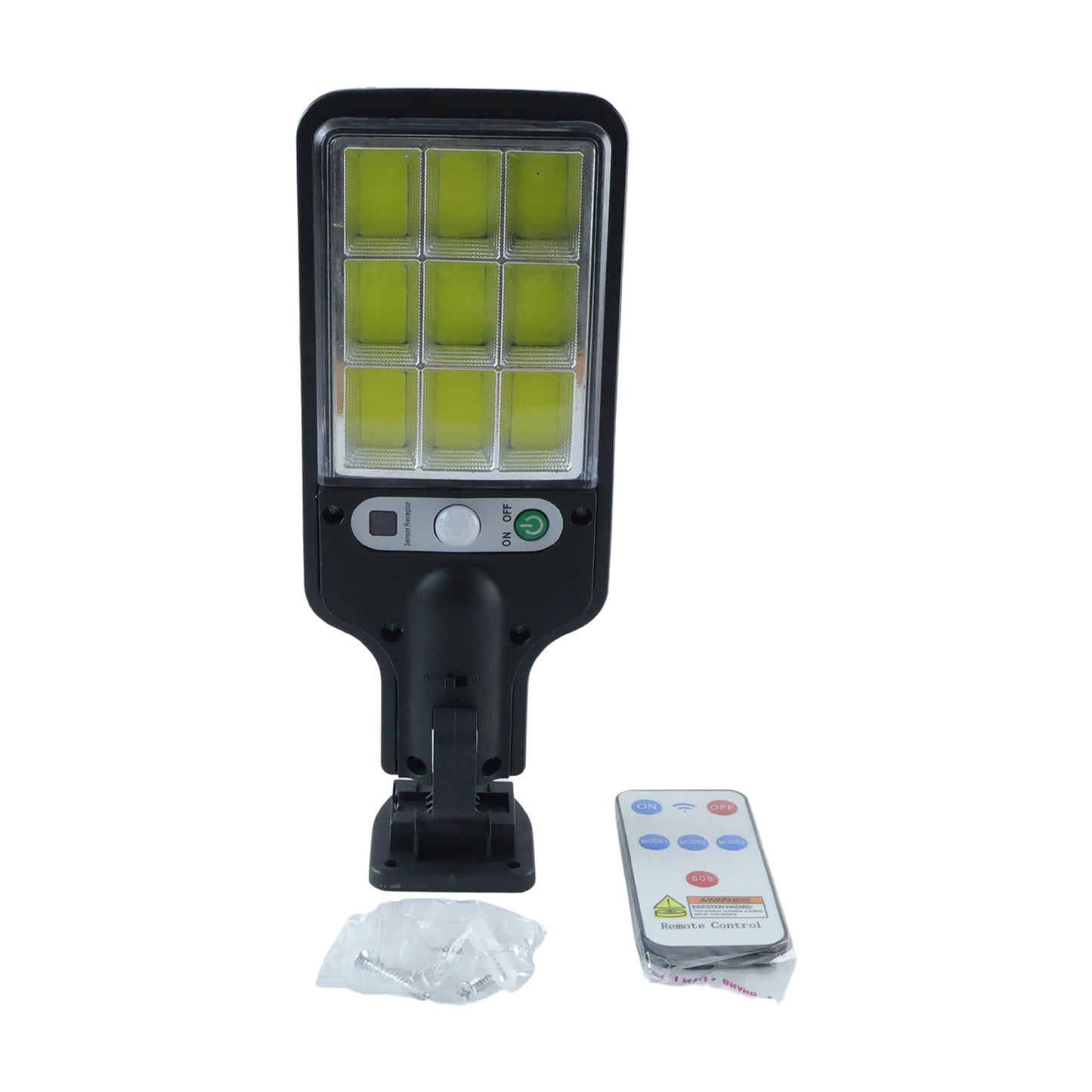 The black solar LED street light, remote control, and mounting screws are arranged on a white background.