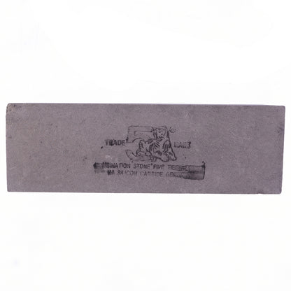 Double sided sharpening stone for tools and blades
