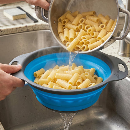 Sturdy silicone colander with fine drain holes for quick drainage.