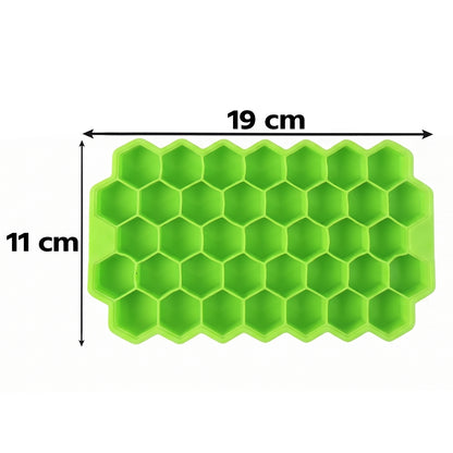 A bright green silicone ice cube tray with hexagonal cells is shown with white text displaying its dimensions: 19 cm length