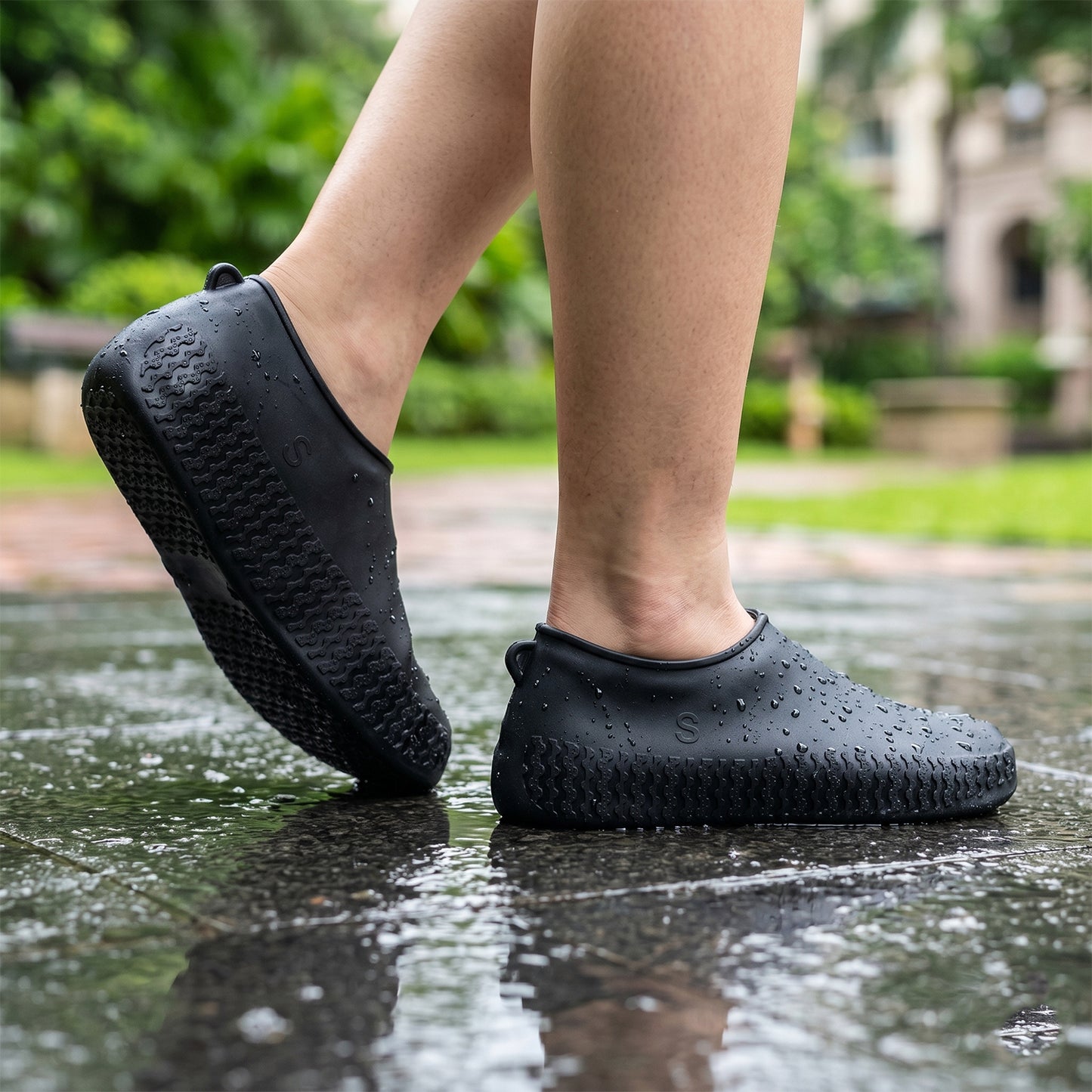 Reusable non-slip silicone shoe cover in black for rain protection