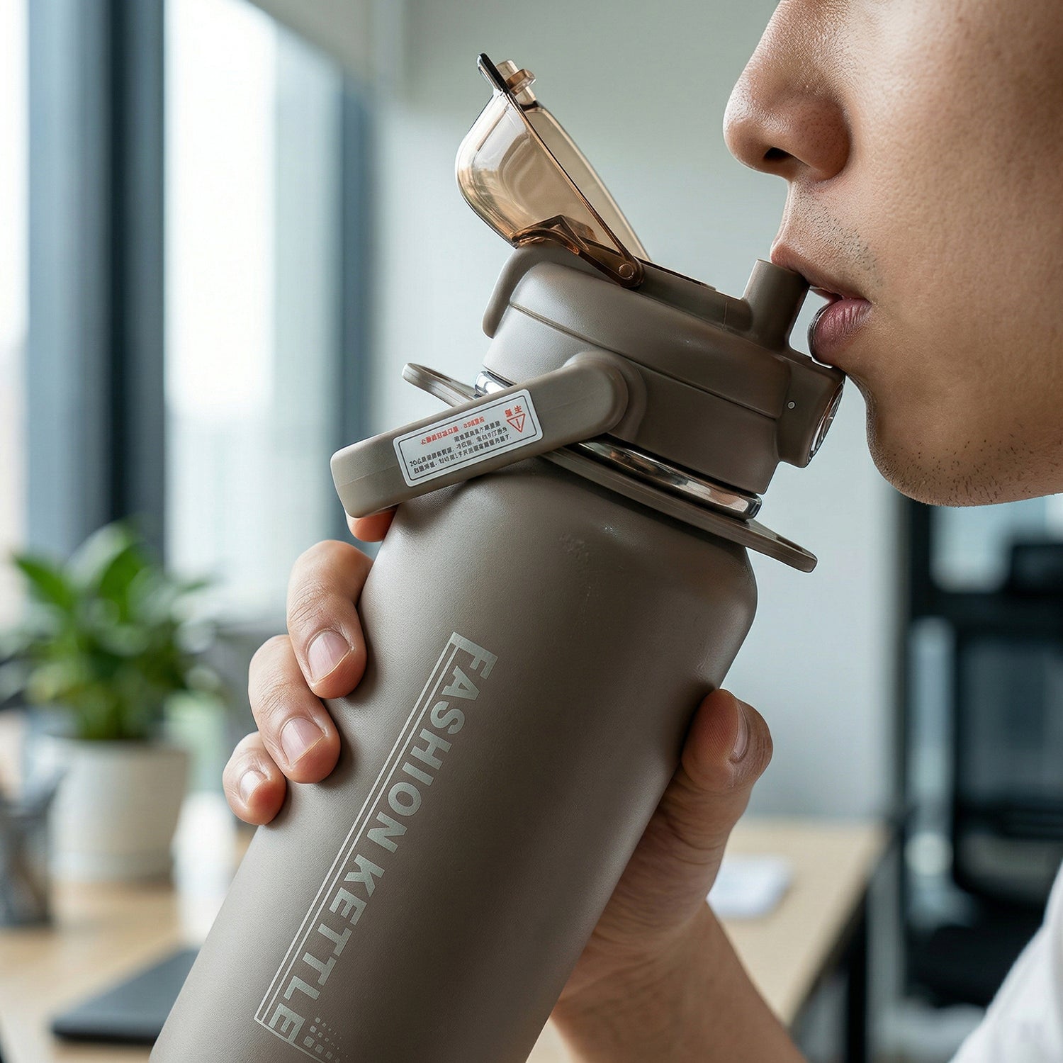 Water bottle lid with straw detail