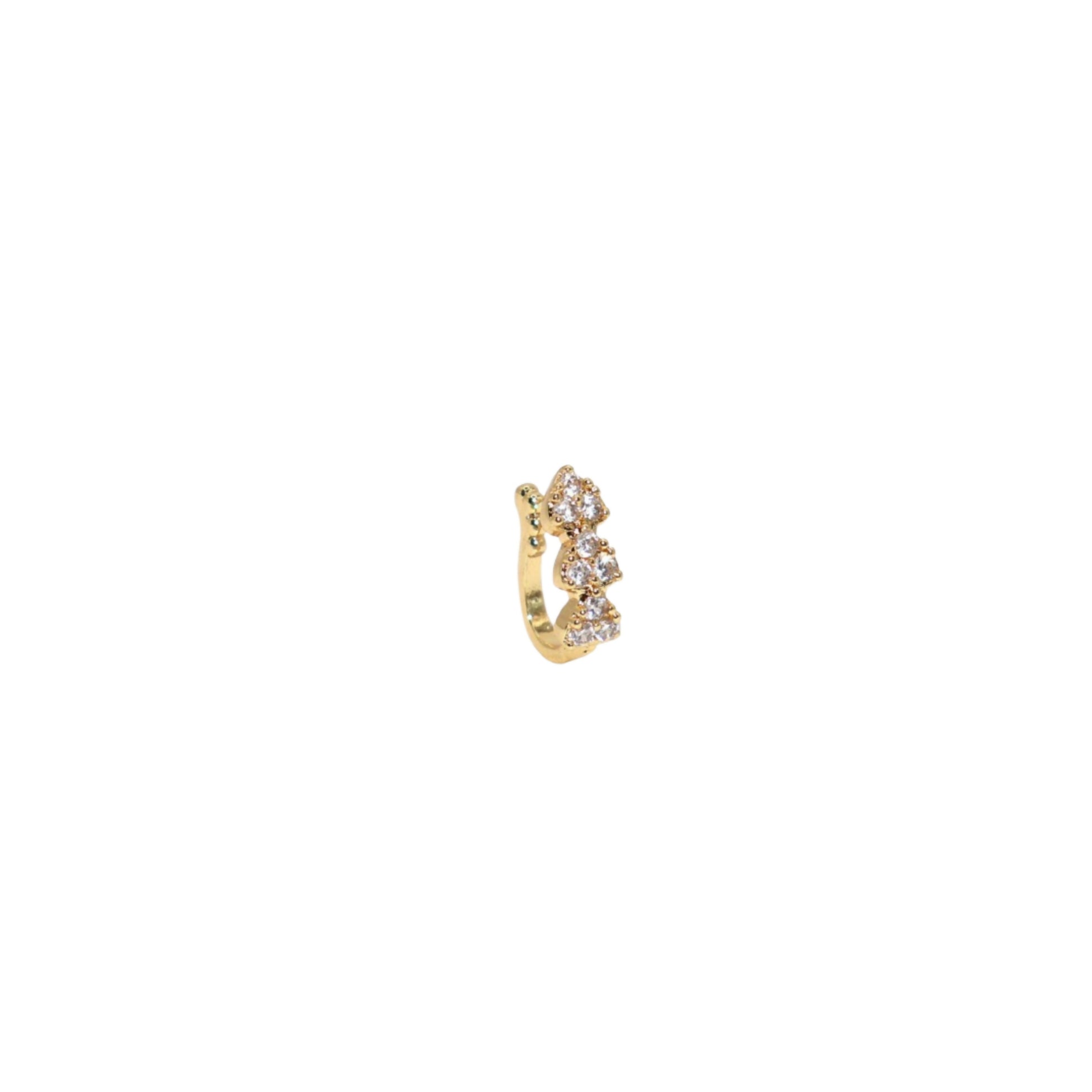 Close-up of gold plated clip-on nose ring with heart-shaped cubic zirconia stones and sparkling accents