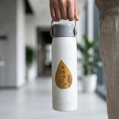 Glass water bottle highlighting ergonomic design