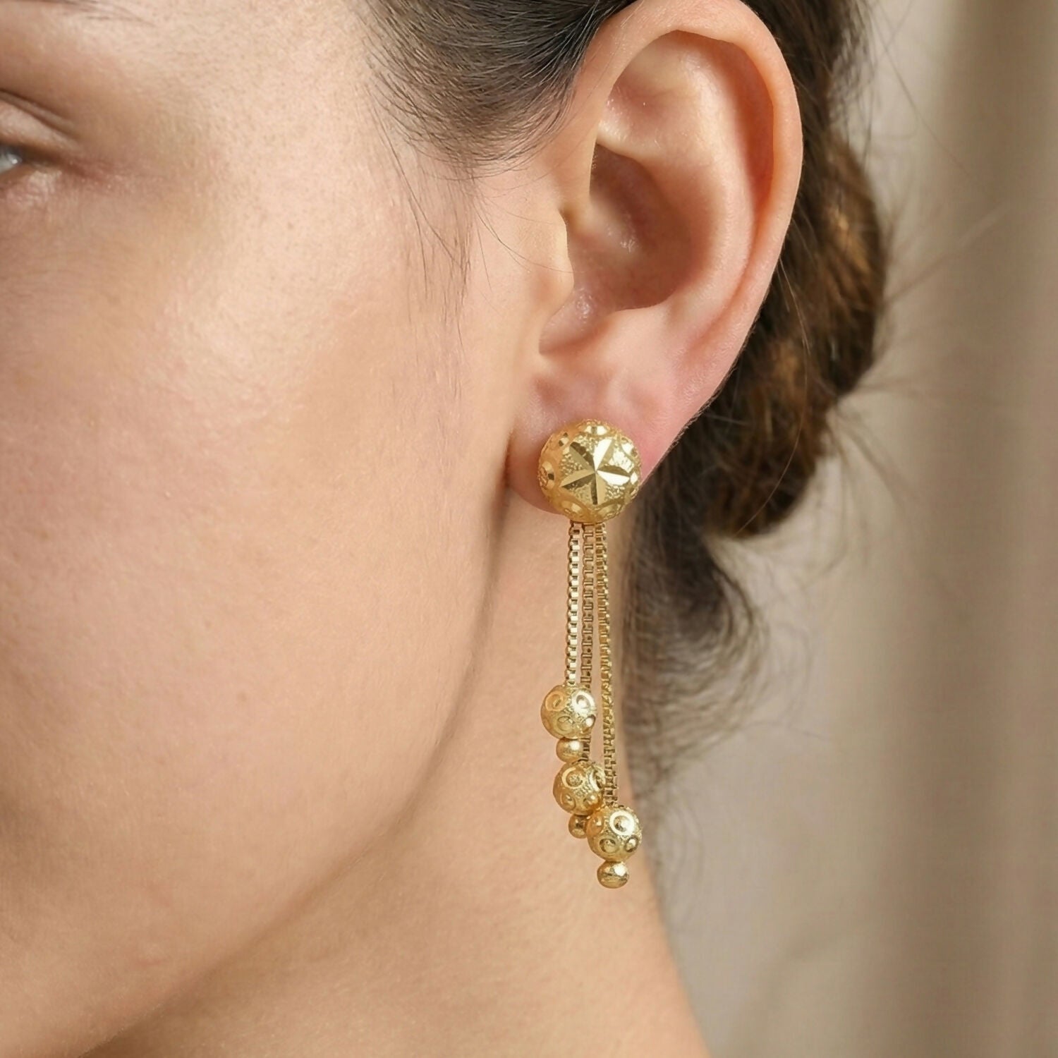 Heart Motif Designer Gold Earrings With Stone Line Work And Elegant Hanging Drop