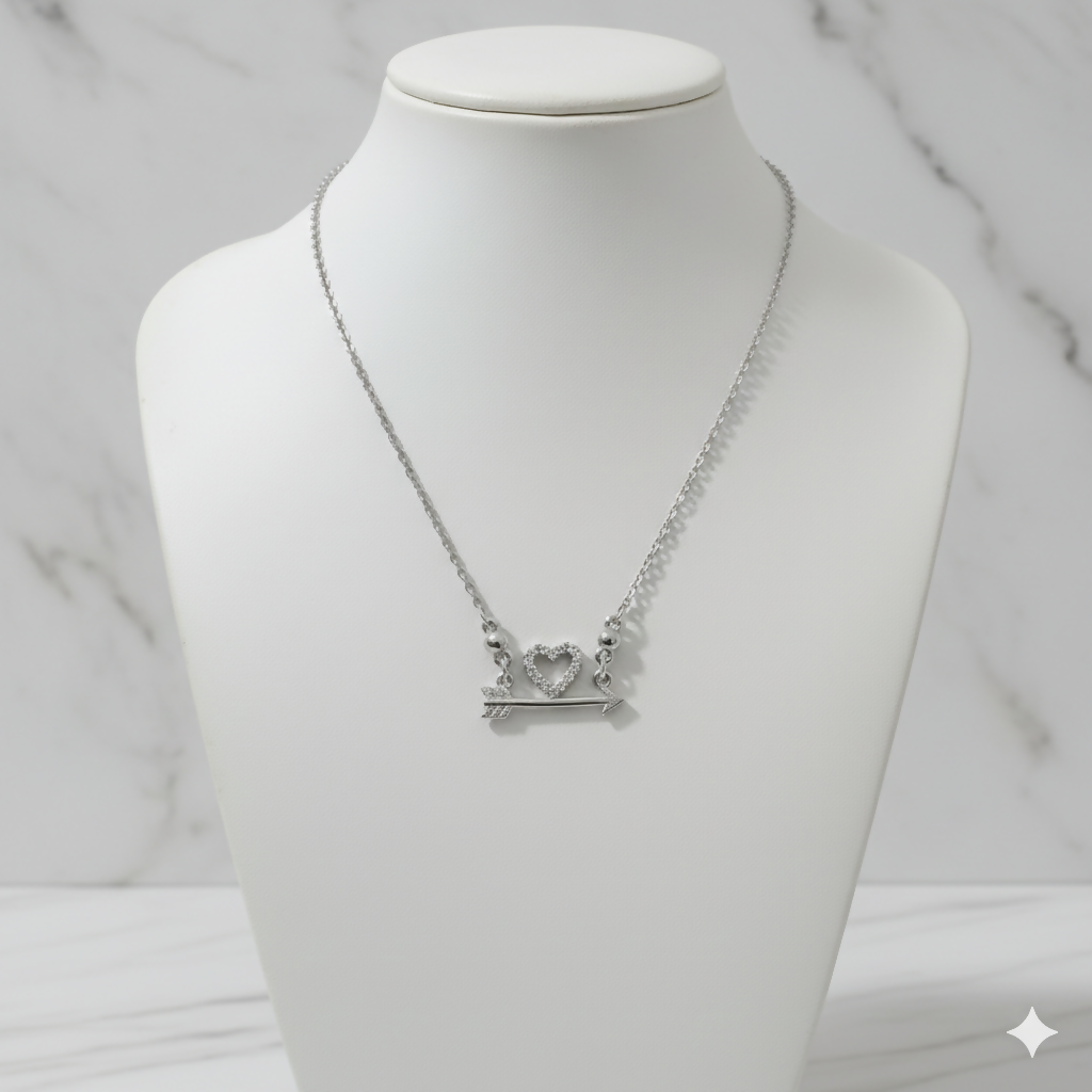 Silver plated Heart & Arrow Pendant Necklace displayed on a delicate cable chain for women