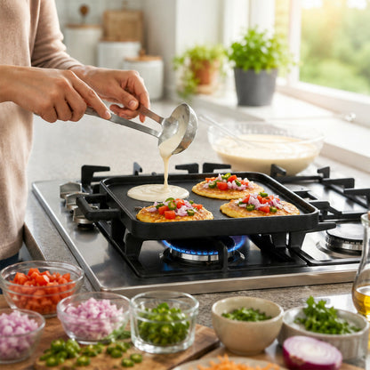 Side view of 4 pit cast iron uttapam tawa