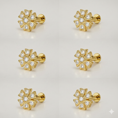 Close-up of gold plated floral crystal nosepin stud showcasing intricate flower design