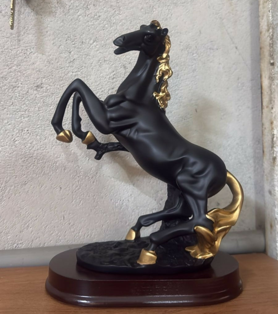 Detailed texture of black gold horse showpiece
