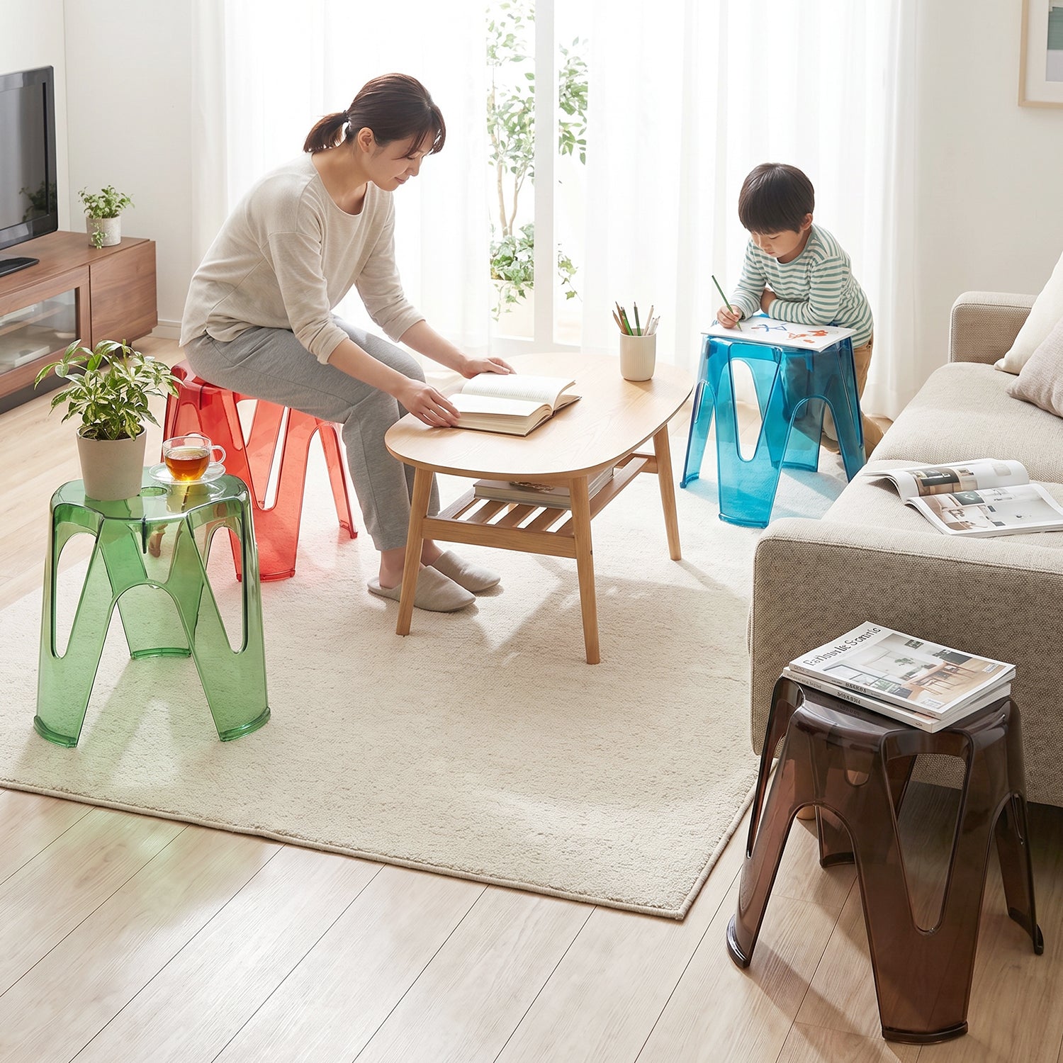 Detailed shot of the sturdy construction and sleek finish of a transparent plastic stool.