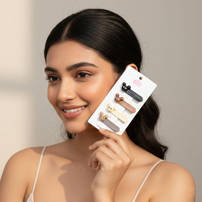 Face closeup with cartoon bear hair pins
