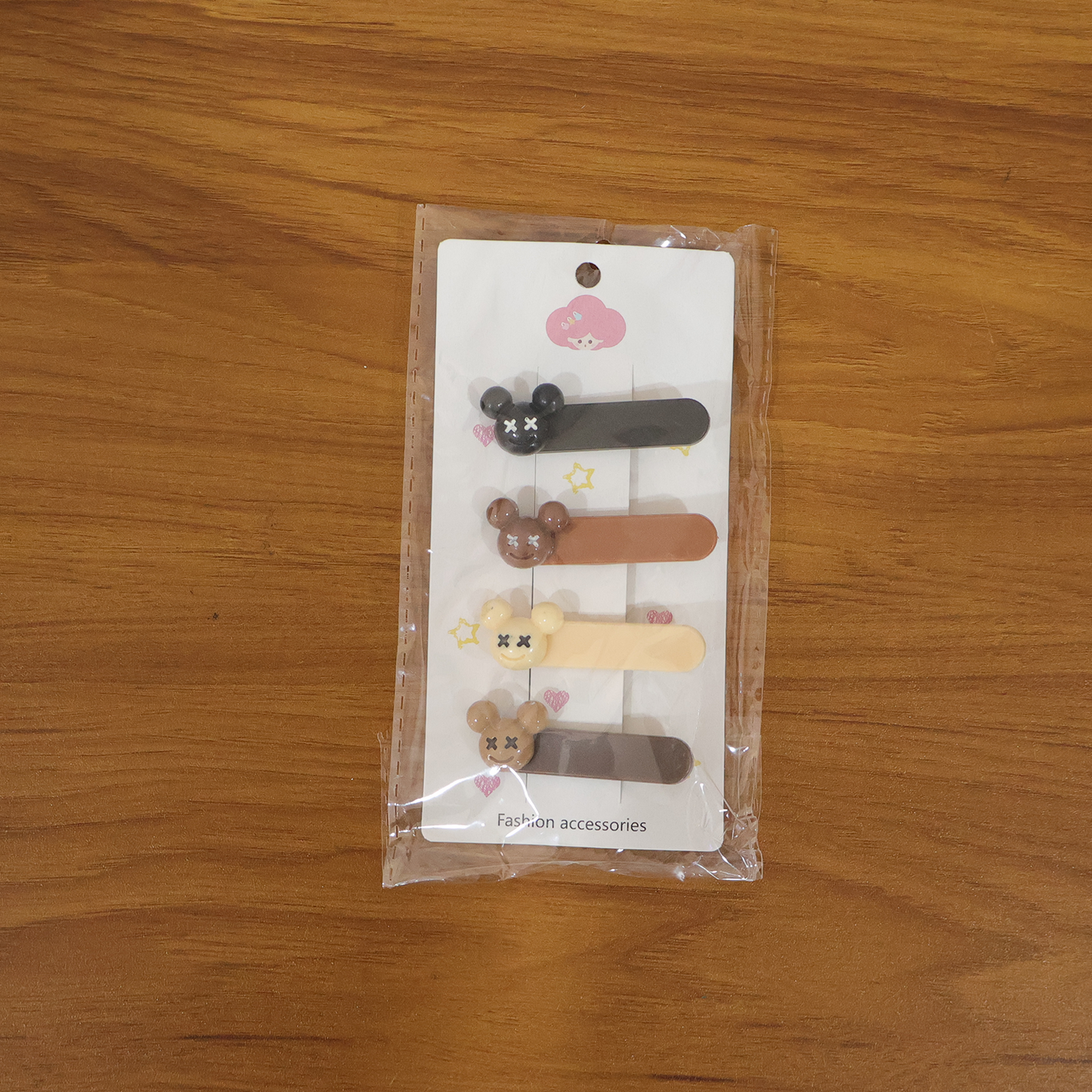 Live model wearing cartoon bear hair clips