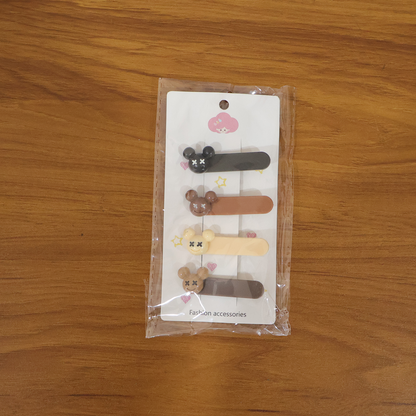 Live model wearing cartoon bear hair clips