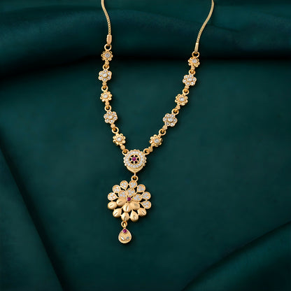 Front view of elegant gold-tone floral pendant necklace set with designer chain detailing
