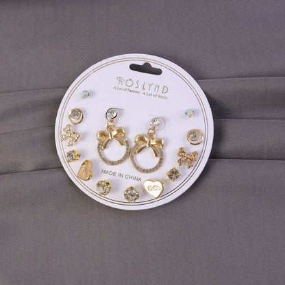 Close-up view of premium gold plated leaf pearl drop earring with a trendy style