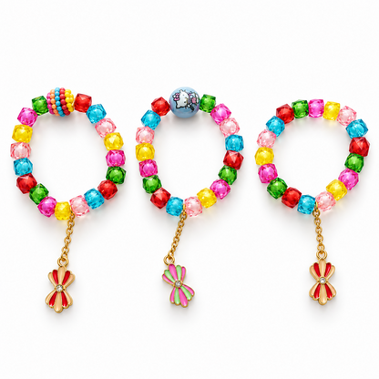 Three distinct colorful beaded bracelets, each with a different charm, are neatly arranged on a white background.