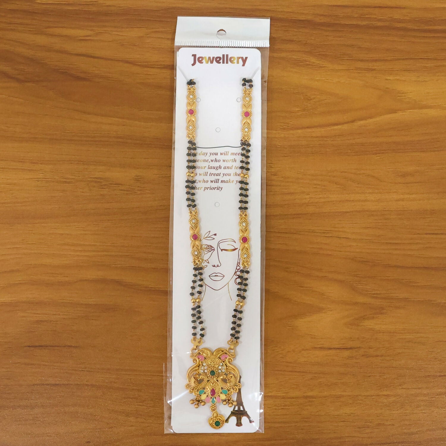 Overall view of the Makara dragon scroll pendant mangalsutra worn as ceremonial jewelry